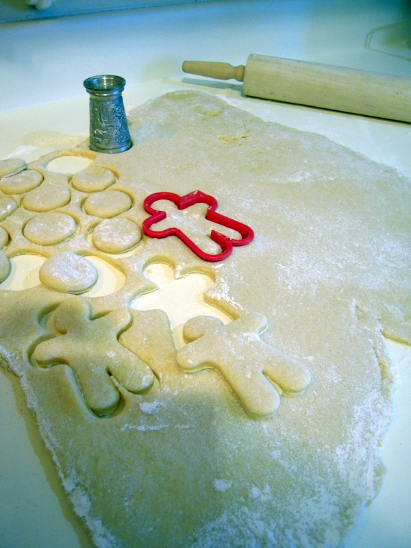 cutting the dough for scrumptious Italian Christmas cookies