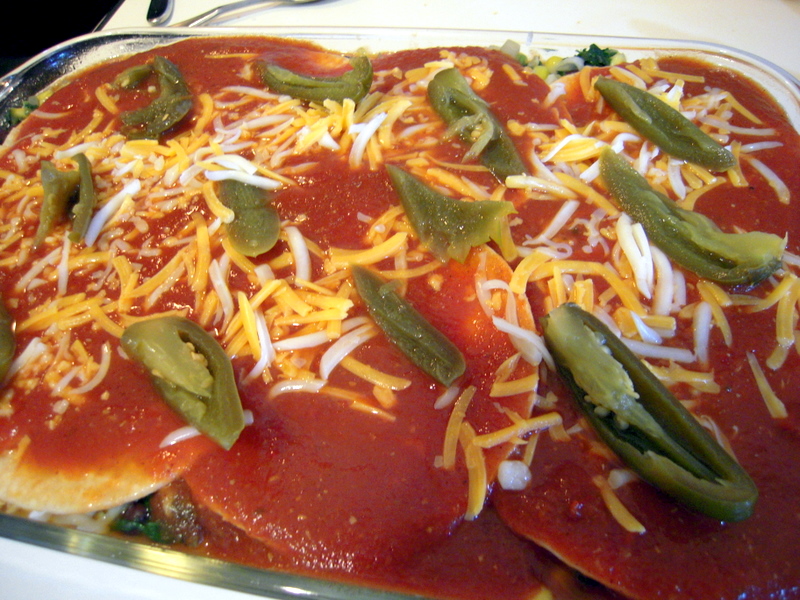 once all layers are placed, cover with remaining sauce and pickled jalapenos